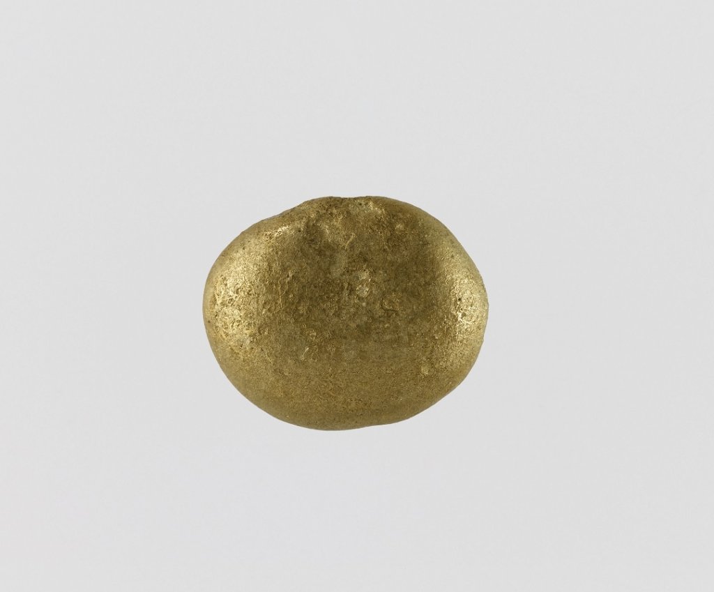 Lingot en forme de disque plat © RMN-Grand Palais (musée du Louvre) / Franck Raux Lingot en forme de disque plat © RMN-Grand Palais (musée du Louvre) / Franck Raux